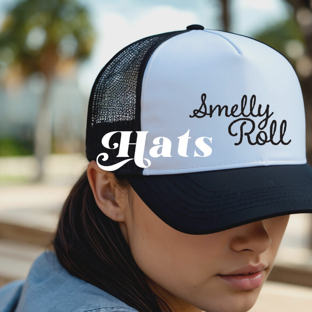 Woman wearing a black and white Smelly Roll parody trucker hat